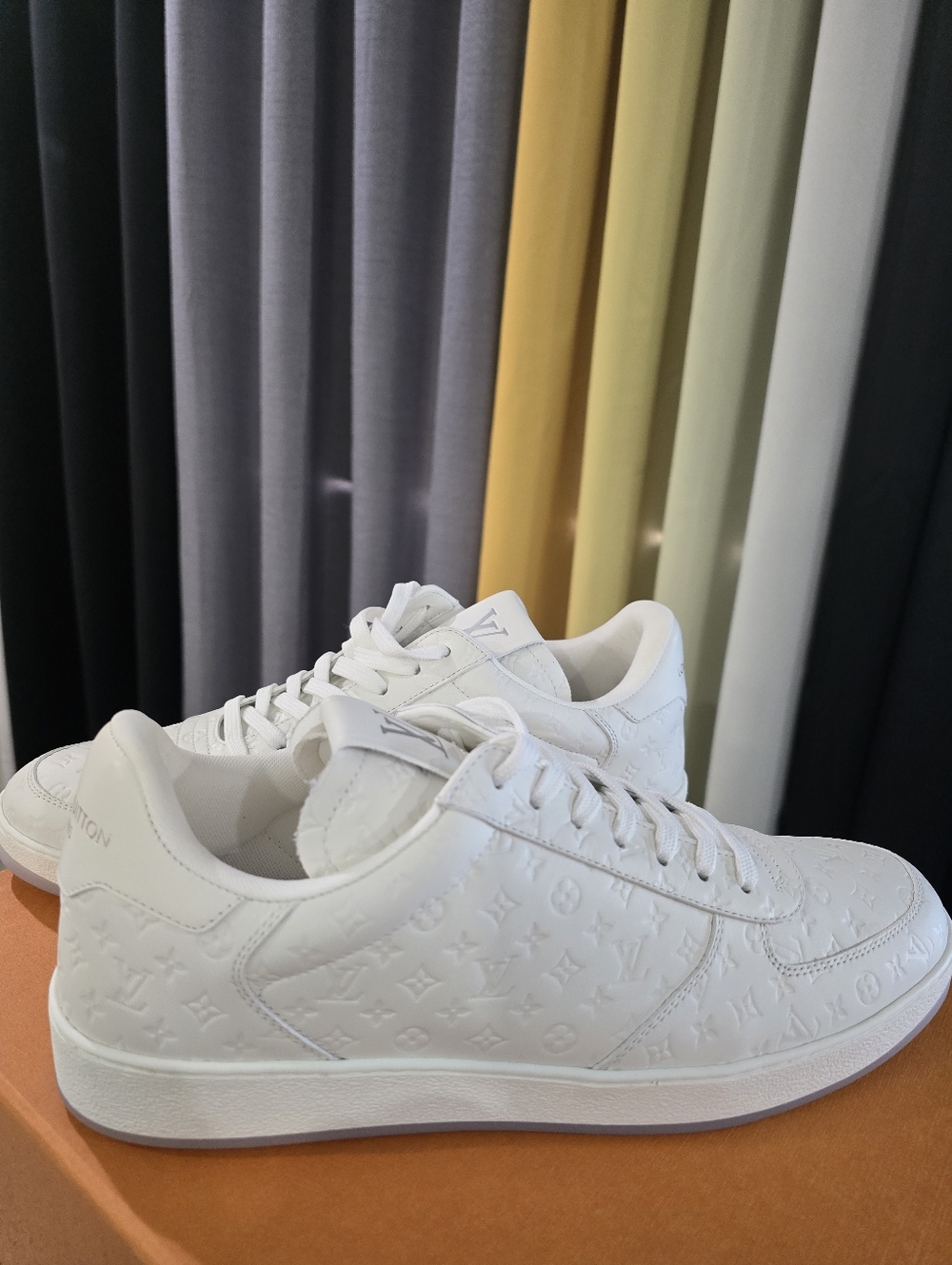 Louis Vuitton All-White Monogram Embossed Low-Top Sneakers